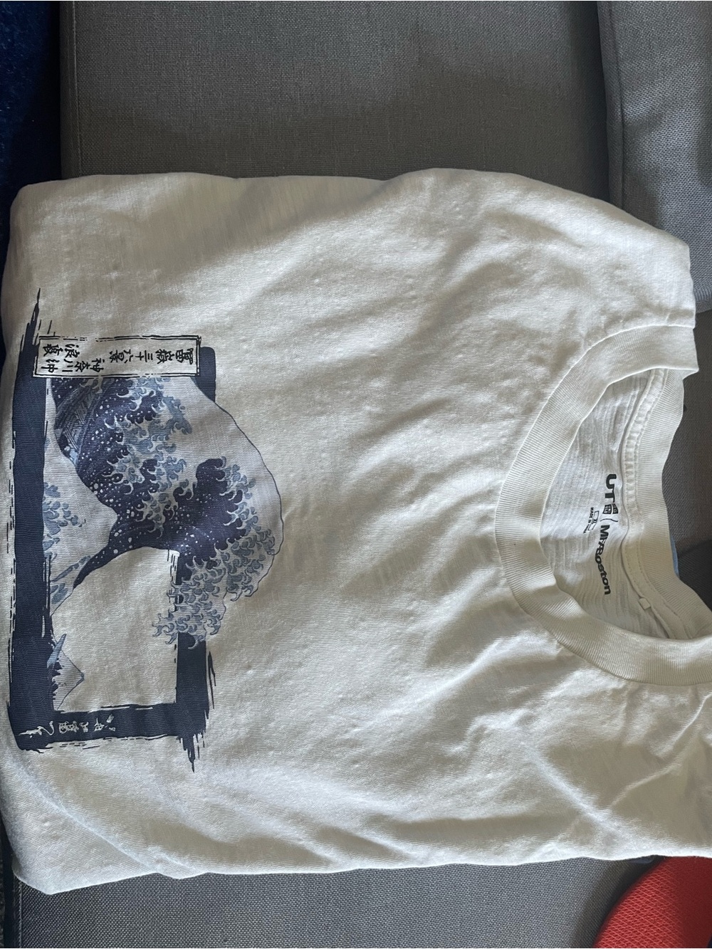 Uniqlo Men’s White T-Shirt with Navy Wave Graphic